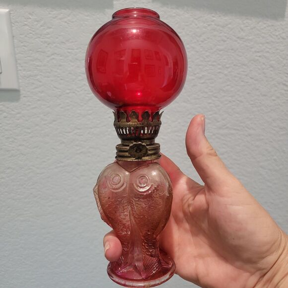 Vtg Mini Oil Lamp Cranberry glass globe with fish bottom RARE Flaw Old World - Picture 9 of 12